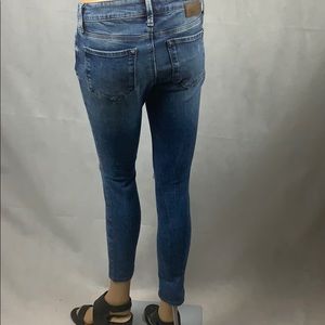 Adriana Mid Rise Distressed Ankle Skinny Jeans